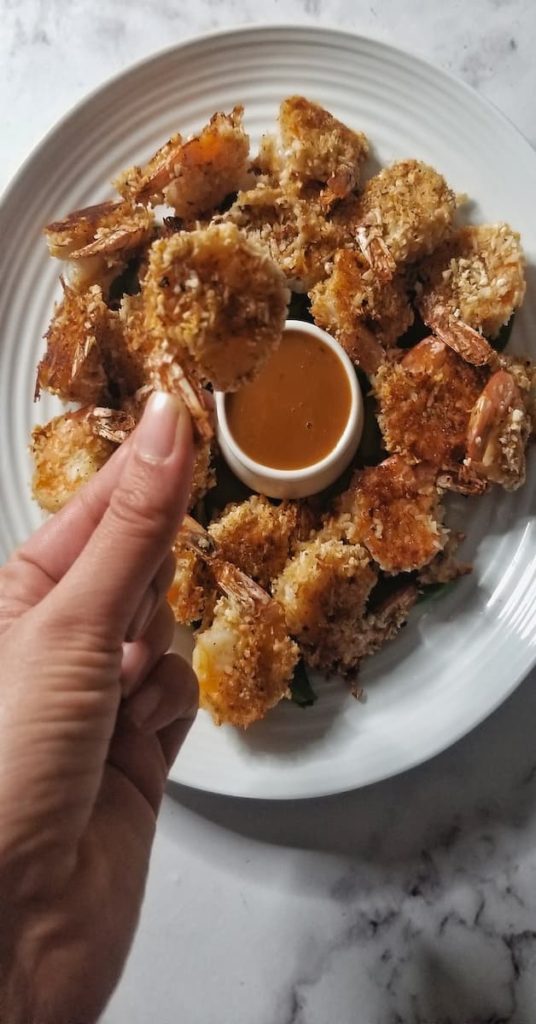 Crispy Baked Coconut Crusted Shrimp which are also Low FODMAP and Gluten Free! The addicting creamy coconut sauce for dipping will ensure that everyone will be coming up for seconds!