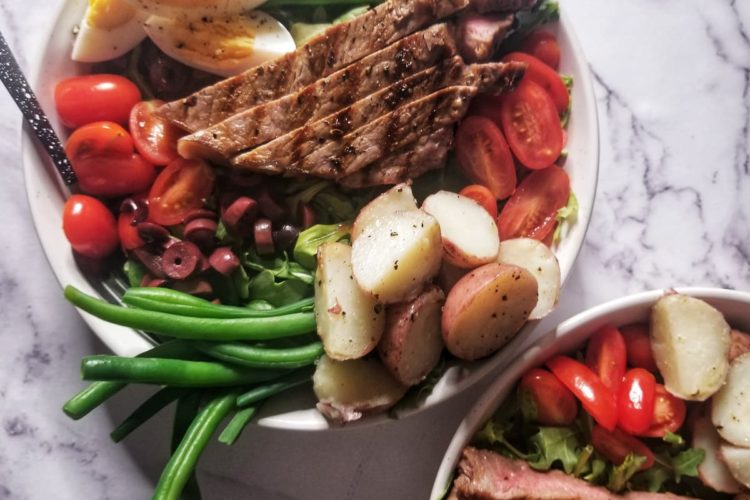 LOW FODMAP TWIST ON THE CLASSIC FRENCH NIÇOISE SALAD WITH EGG, POTATOES, OLIVES, GREEN BEANS AND TOMATOES