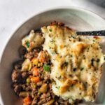A delicious spin on the classic Shepherd's Pie - this venison shepherd's pie uses perfectly seasoned ground veggies hidden away underneath a layer of the creamiest mashed potatoes
