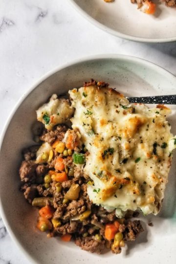 A delicious spin on the classic Shepherd's Pie - this venison shepherd's pie uses perfectly seasoned ground veggies hidden away underneath a layer of the creamiest mashed potatoes
