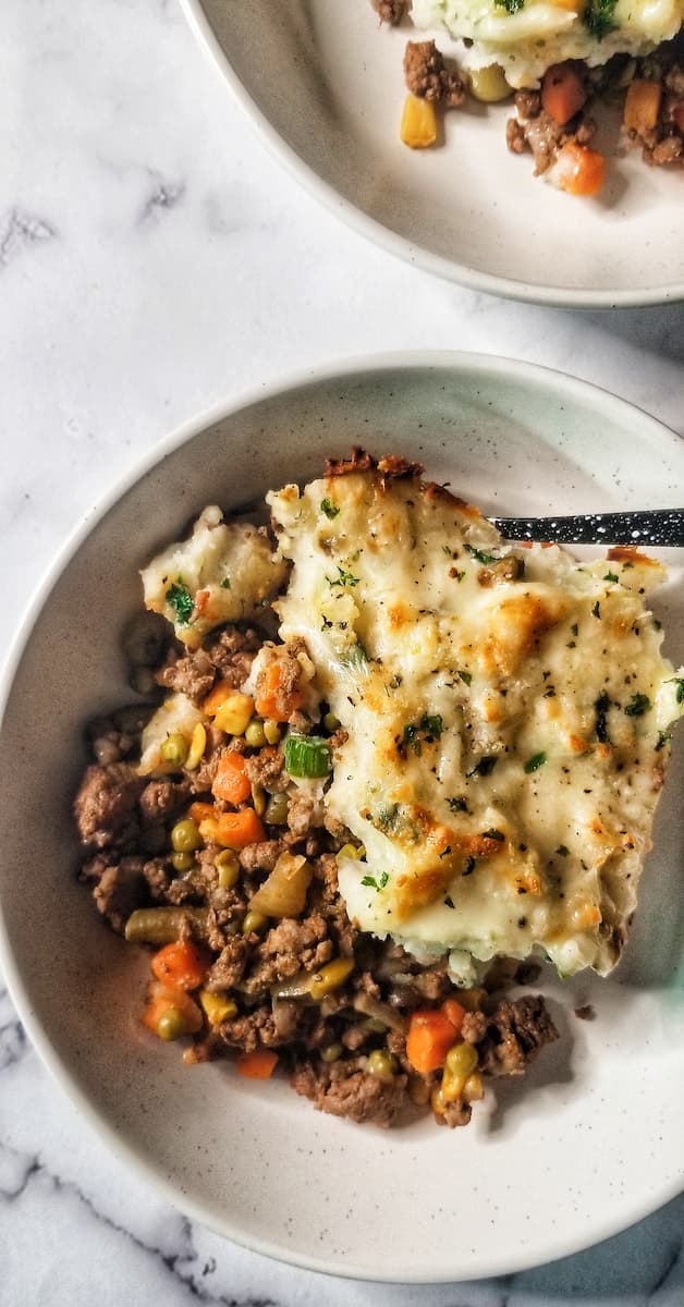 A delicious spin on the classic Shepherd's Pie - this venison shepherd's pie uses perfectly seasoned ground veggies hidden away underneath a layer of the creamiest mashed potatoes
