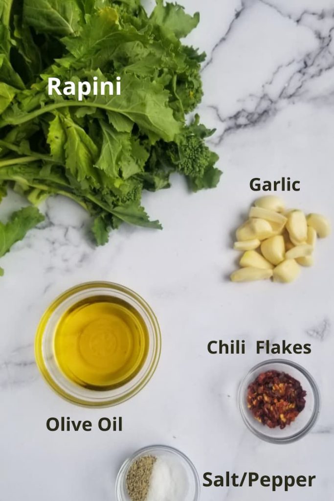 ingredients for rapini recipe - rapini, garlic, olive oil, chili flakes, salt/pepper