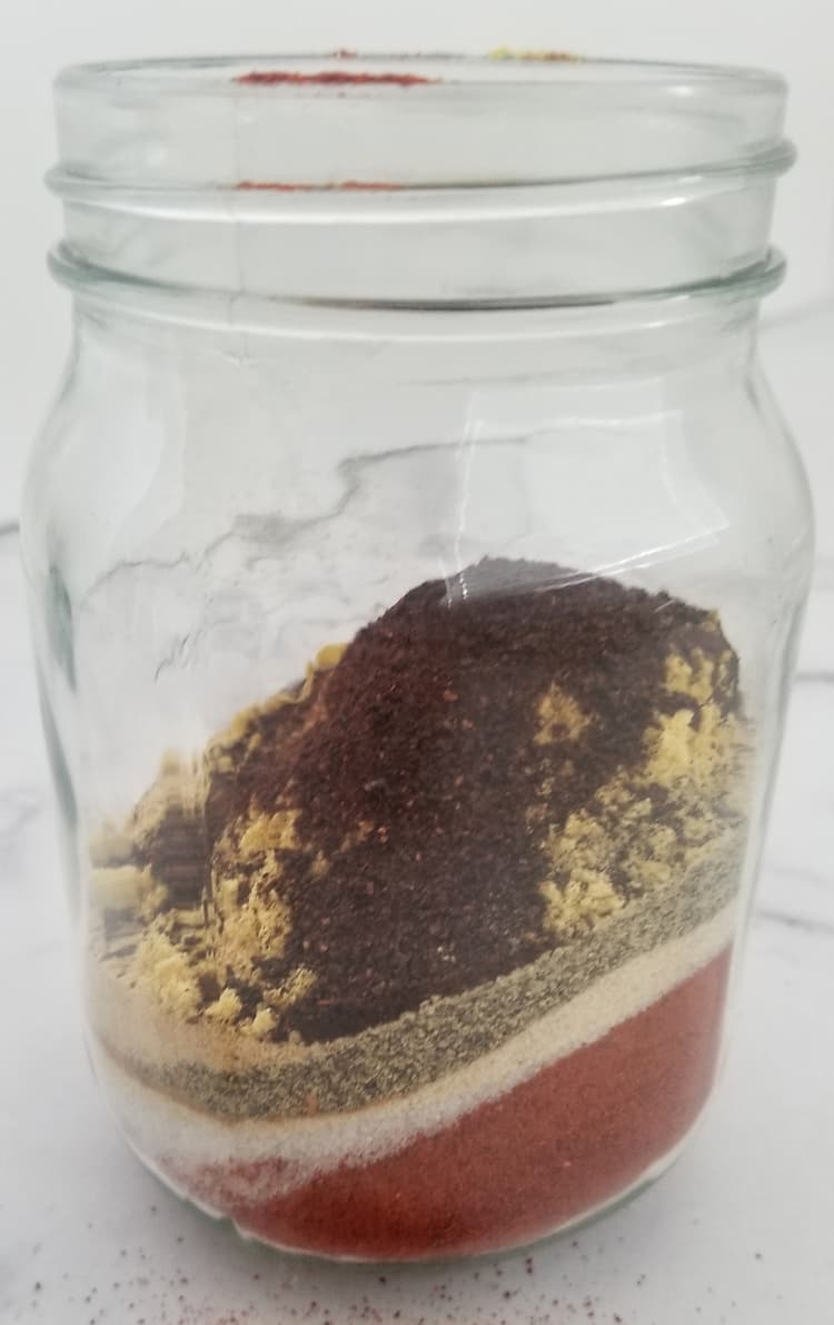 jar with layered spices