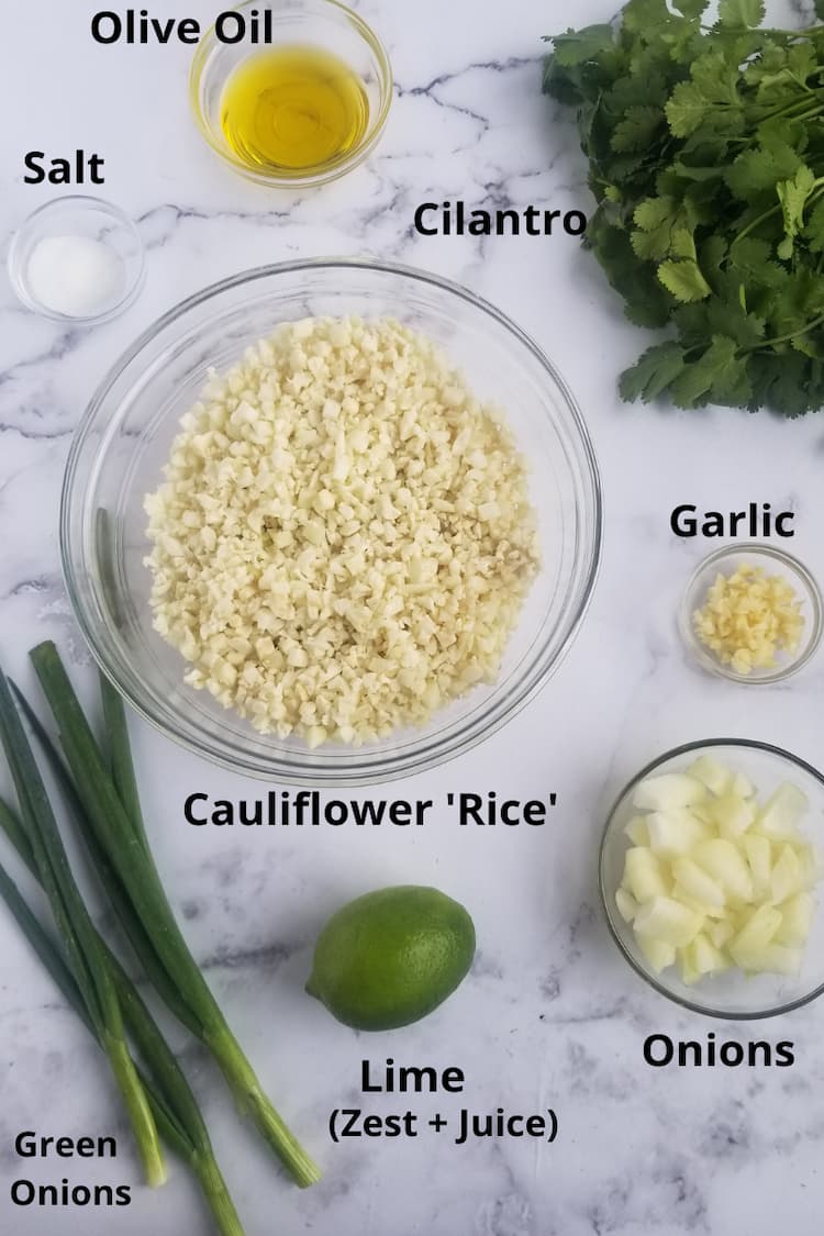 ingredients for cauliflower rice cilantro lime - cilantro, cauliflower rice, lime, olive oil, garlic, onions, green onions, salt