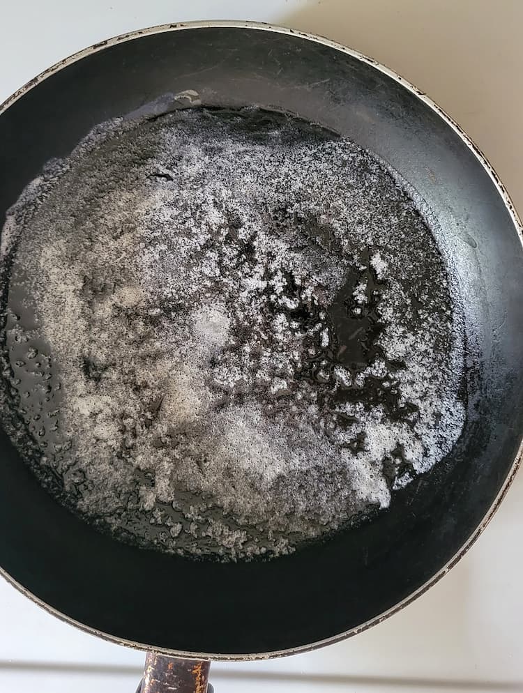 skillet with melted butter
