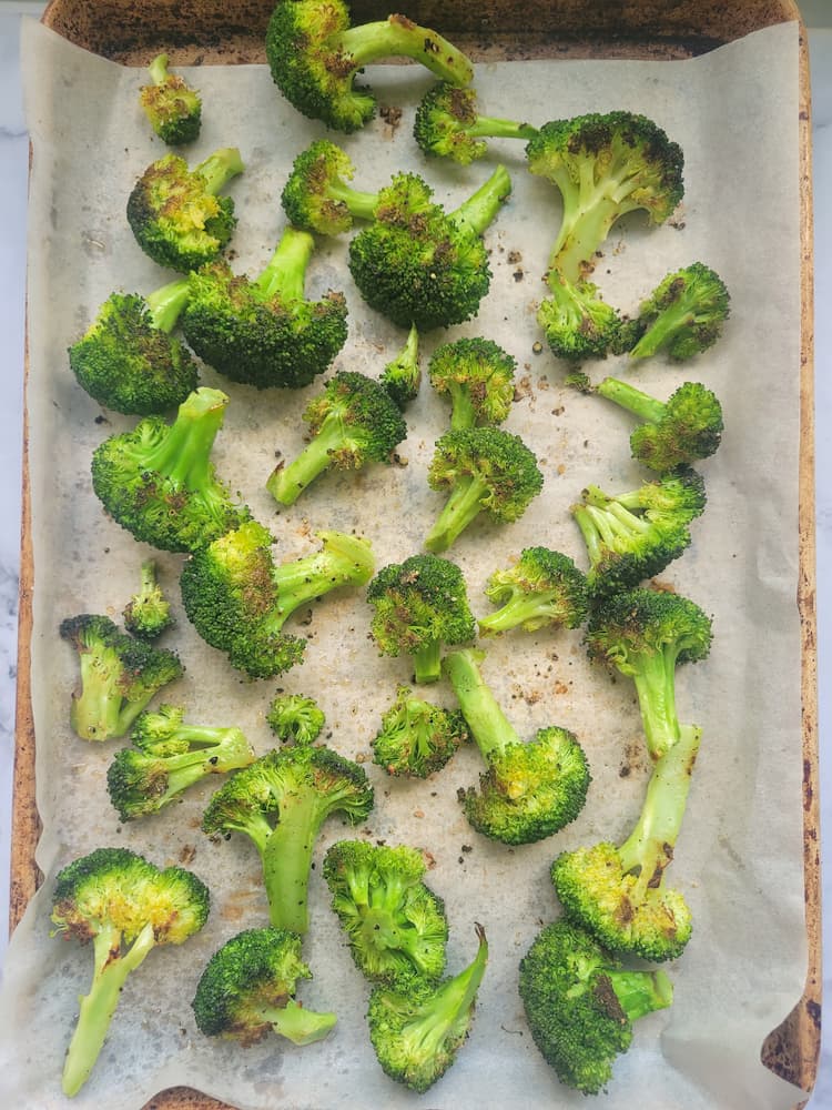 sheet pan with roasted broccoli florets