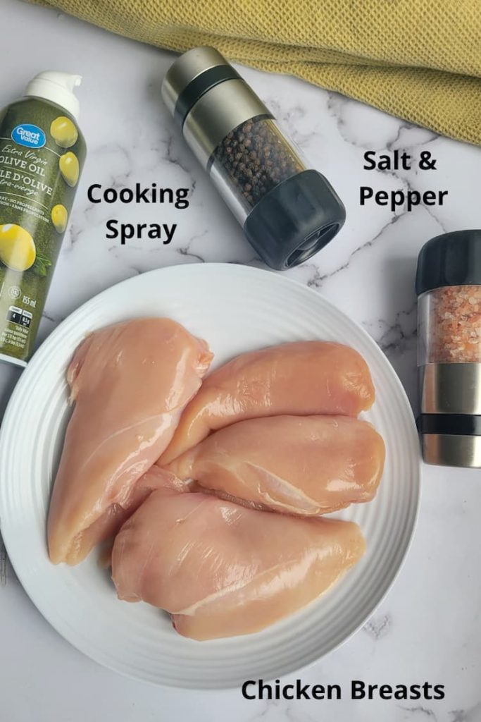 ingredients for air fryer chicken breast recipe - chicken breast, cooking spray, salt and pepper