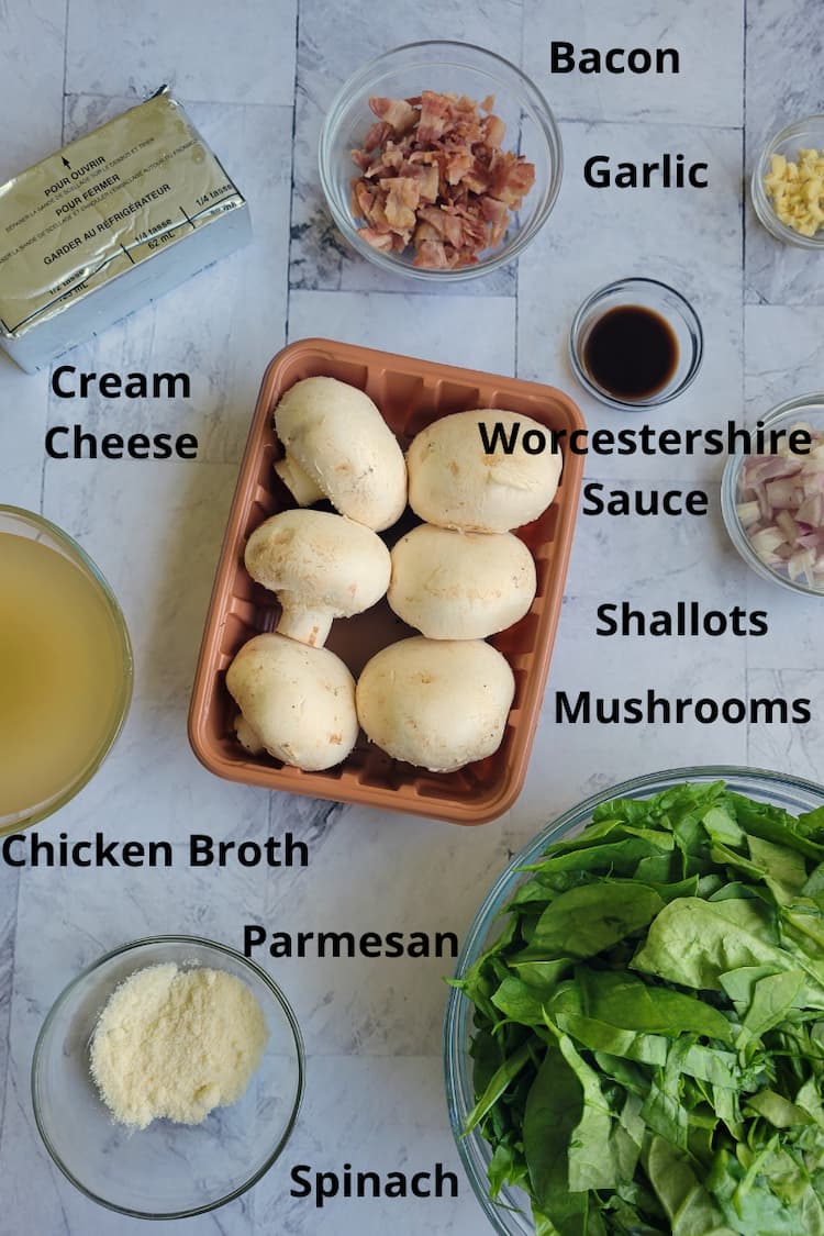 ingredients for stuffed mushrooms recipe - mushrooms, spinach, bacon, shallots, garlic, cream cheese, chicken broth, parmesan, worcestershire sauce