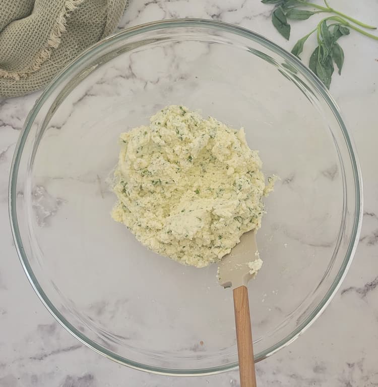 bowl of ricotta filling for eggplant rollatini