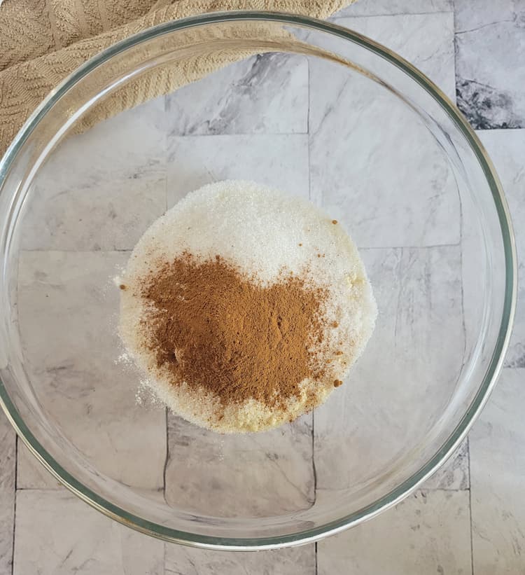 bowl of almond flour with sweetener, pumpkin spice, baking soda and powder
