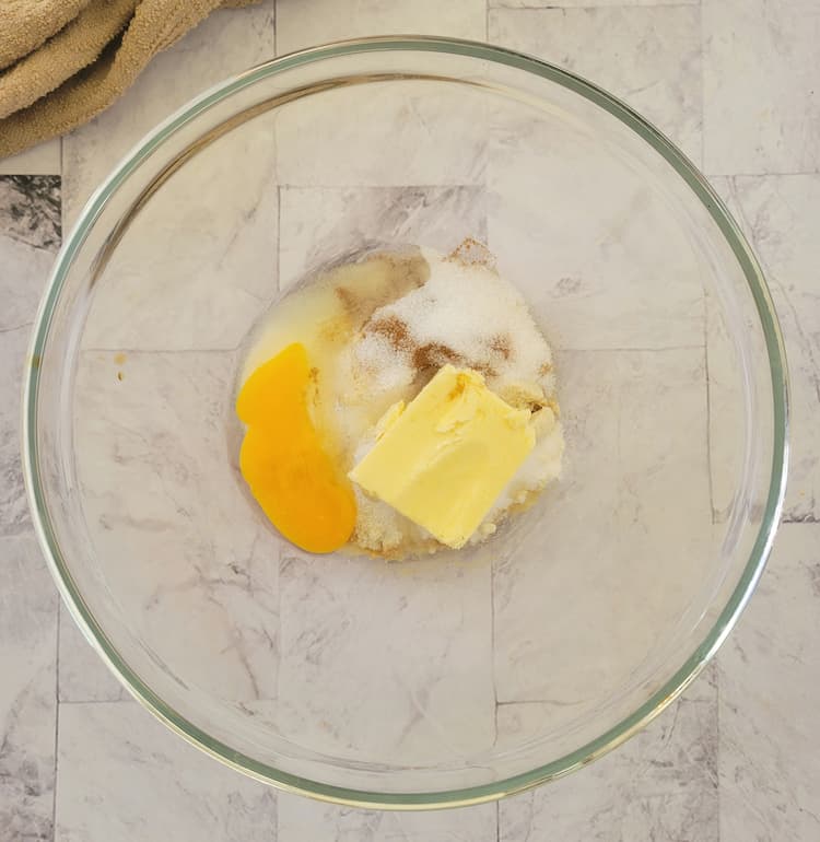 bowl of egg, butter, sweetener, cinnamon