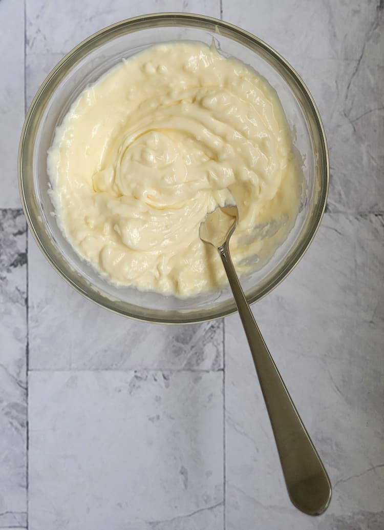 bowl of creamy aioli and a spoon