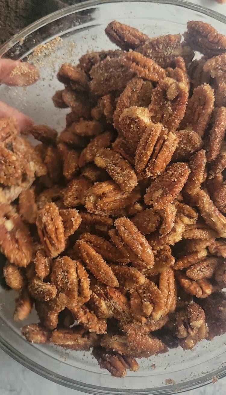 bowl of spiced coated pecans