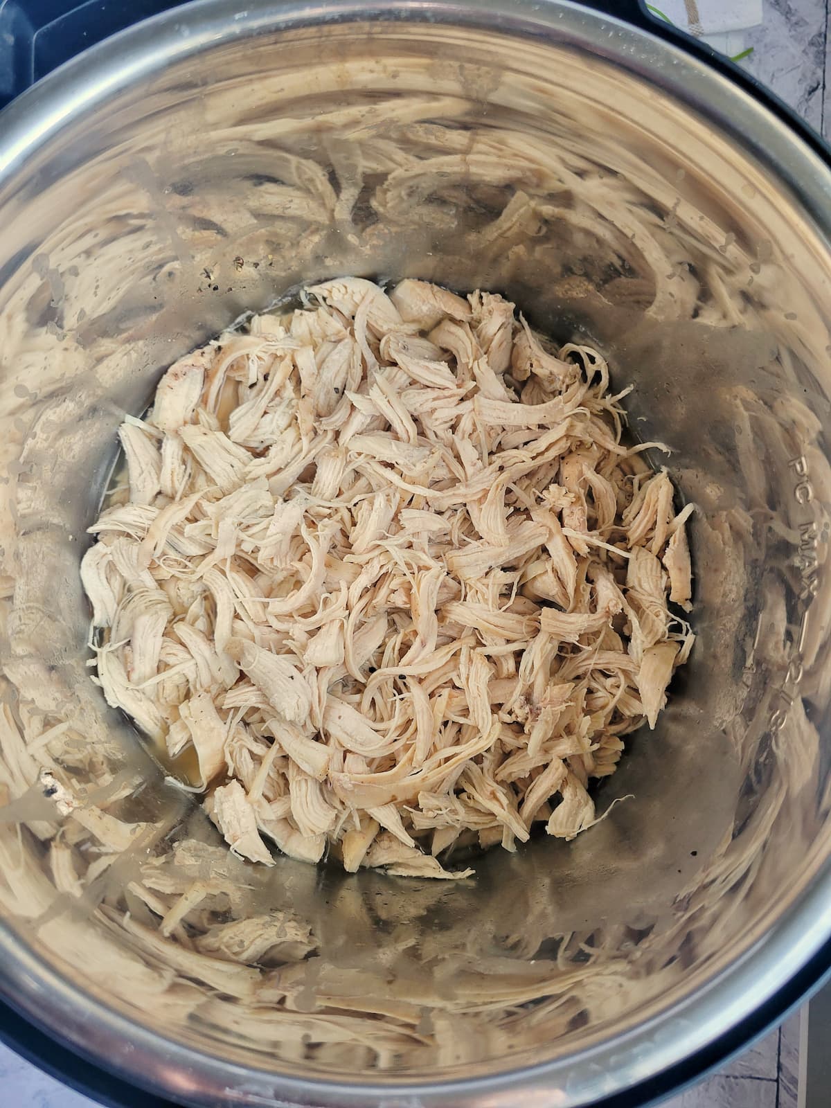shredded chicken in a large pot