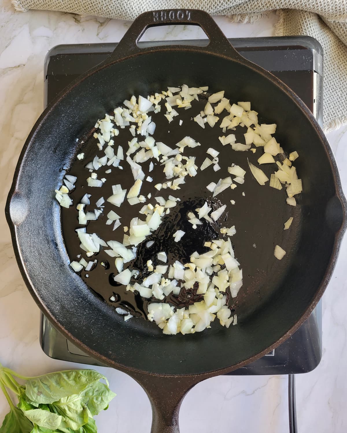 minced onion and oil in a cast iron skillet