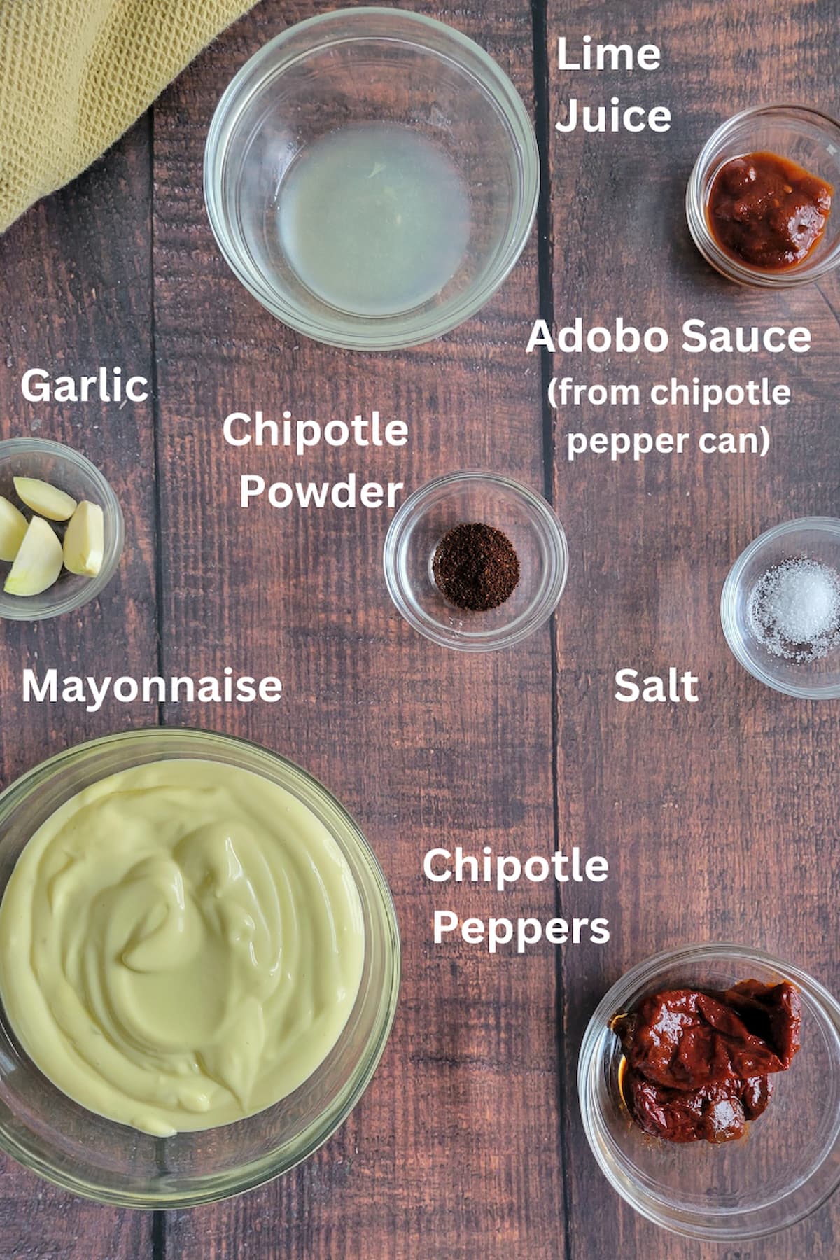 ingredients for chipotle mayo - chipotle powder, adobo sauce, lime juice, salt, garlic, mayonnaise, chipotle peppers, garlic