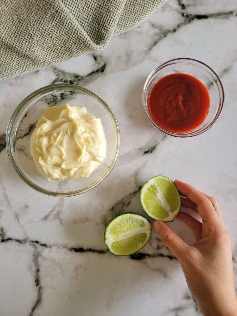 ingredients for spicy mayo - mayo, sriracha and lime