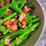 bowl of green beans, bacon and garlic