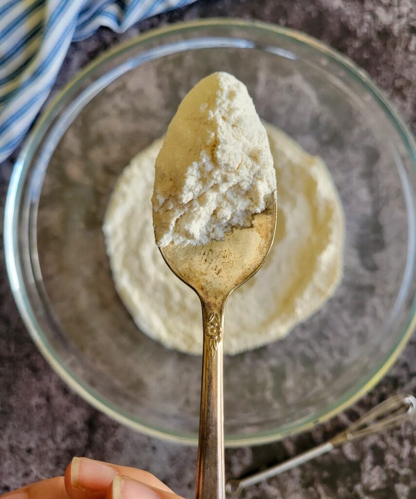 spoonful of flour over a bowl of the rest