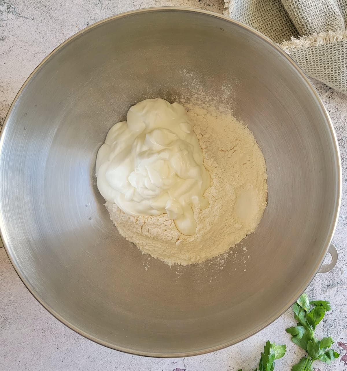 greek yogurt and flour in a bowl