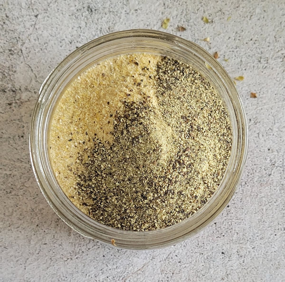 black pepper and garlic powder in a jar