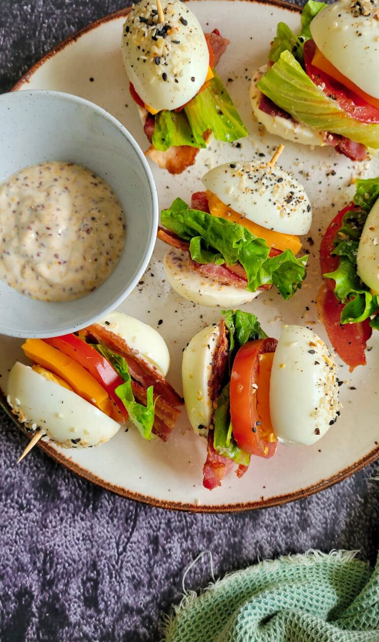 blt egg bites on a plate with grainy mayo