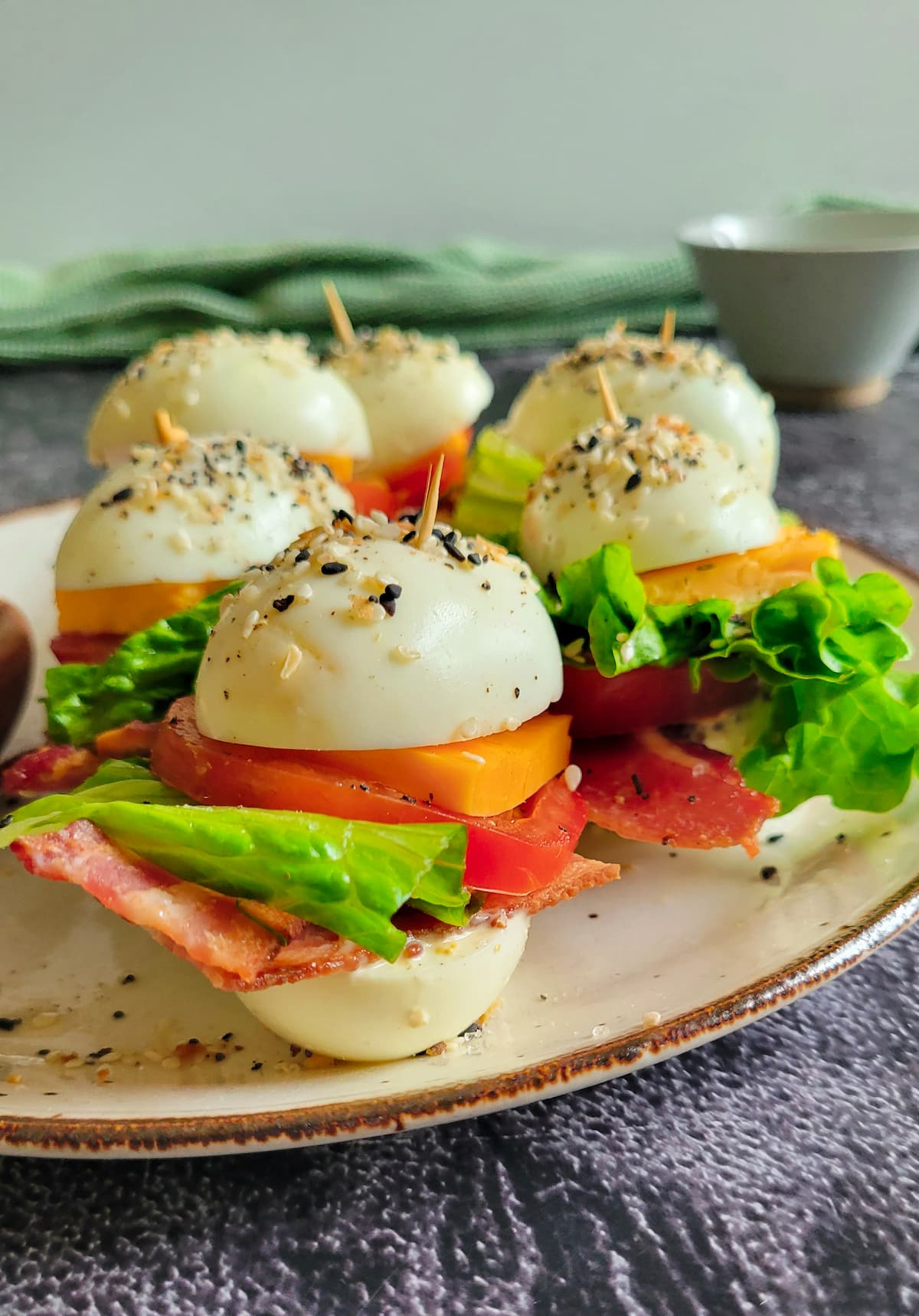 blt egg bites on a plate with everything but the bagel seasoning