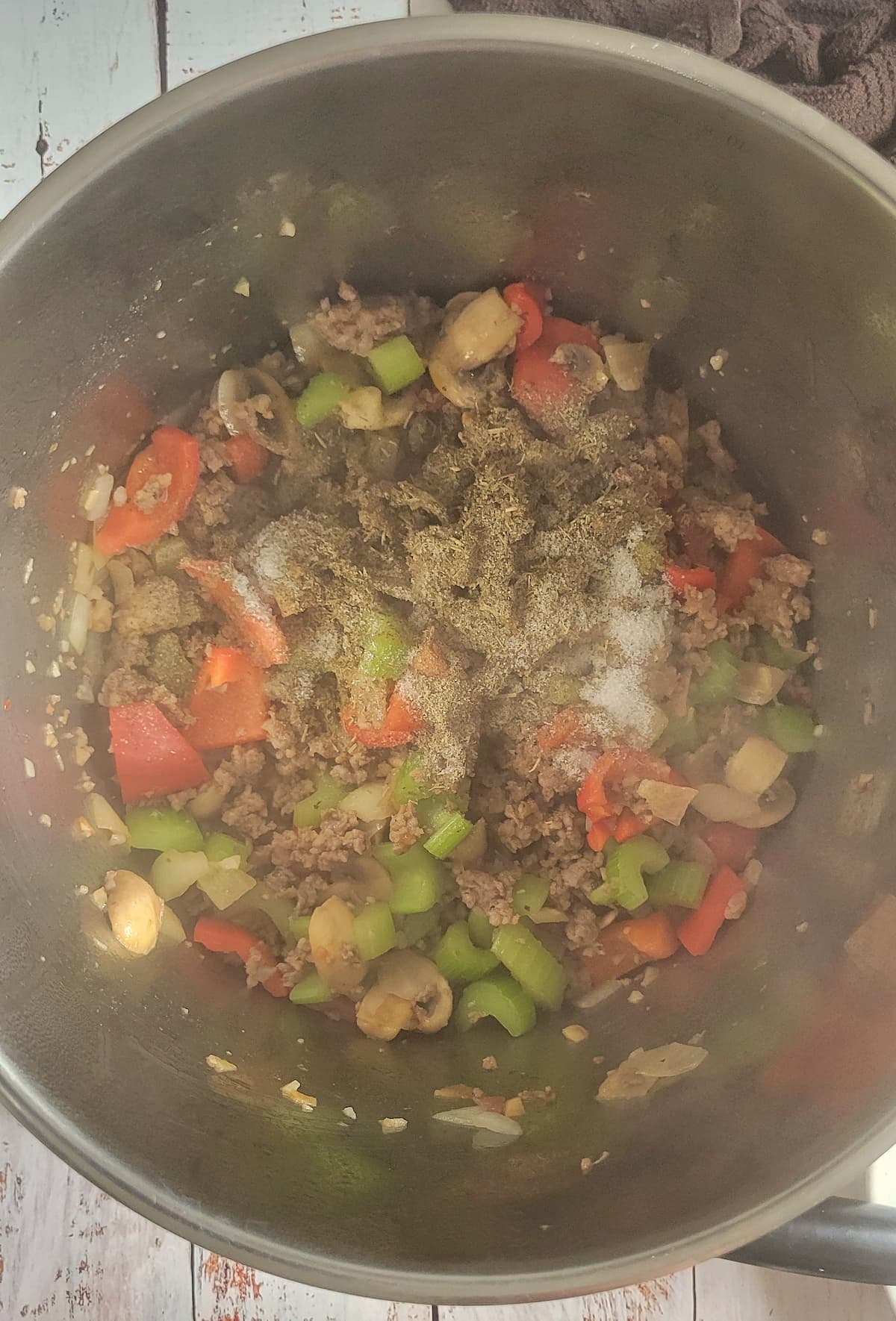chopped veggies and seasonings in a pot