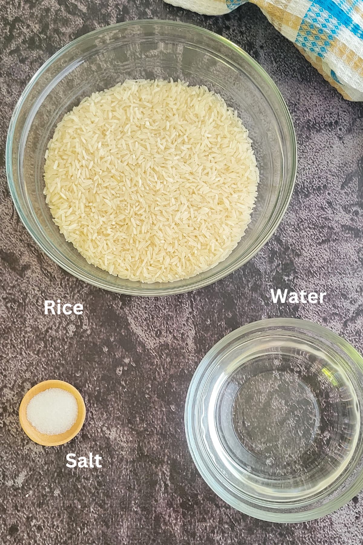 ingredients for white rice in the pressure cooker - rice, water, salt