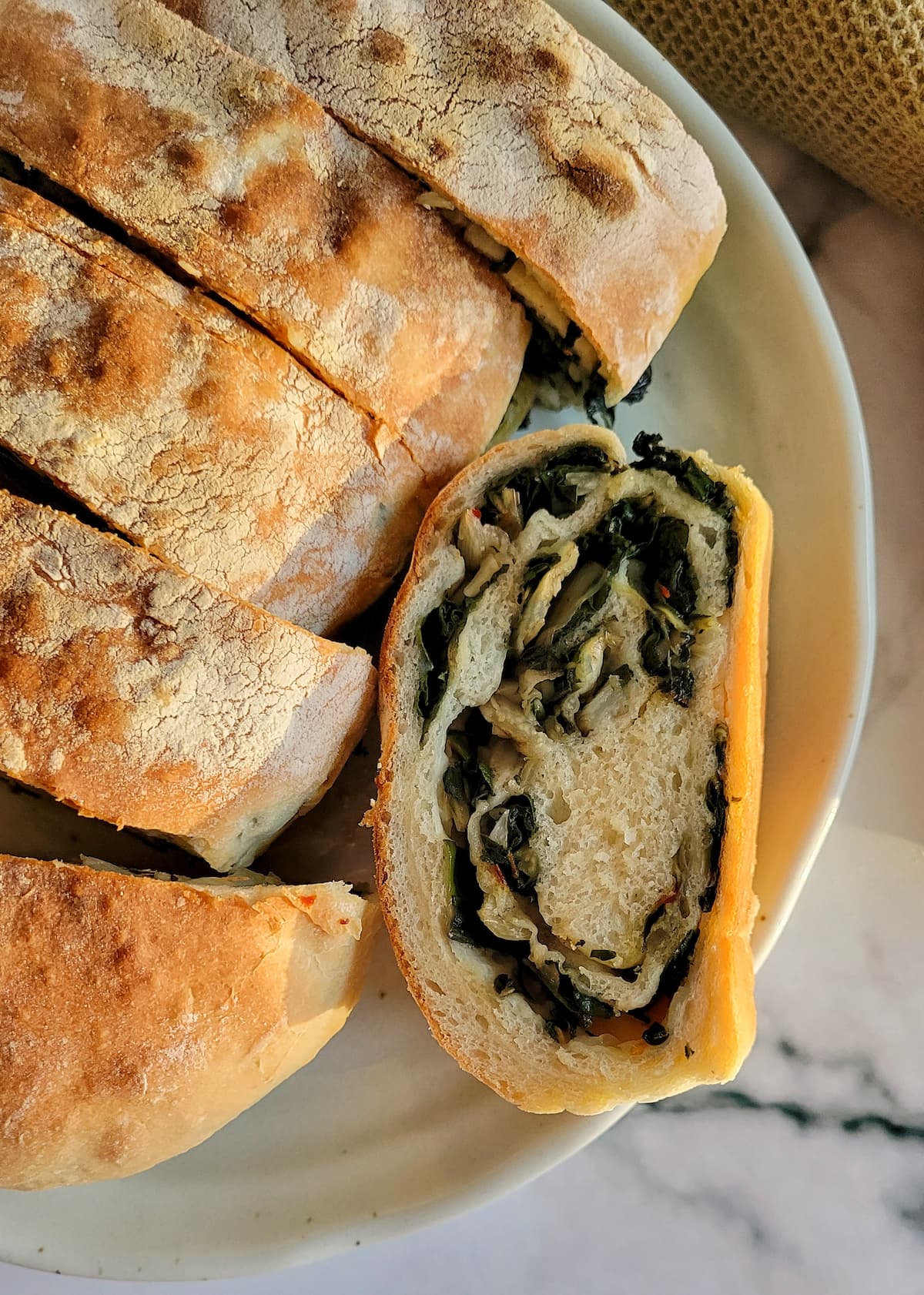 slices of swiss chard roll on a plate