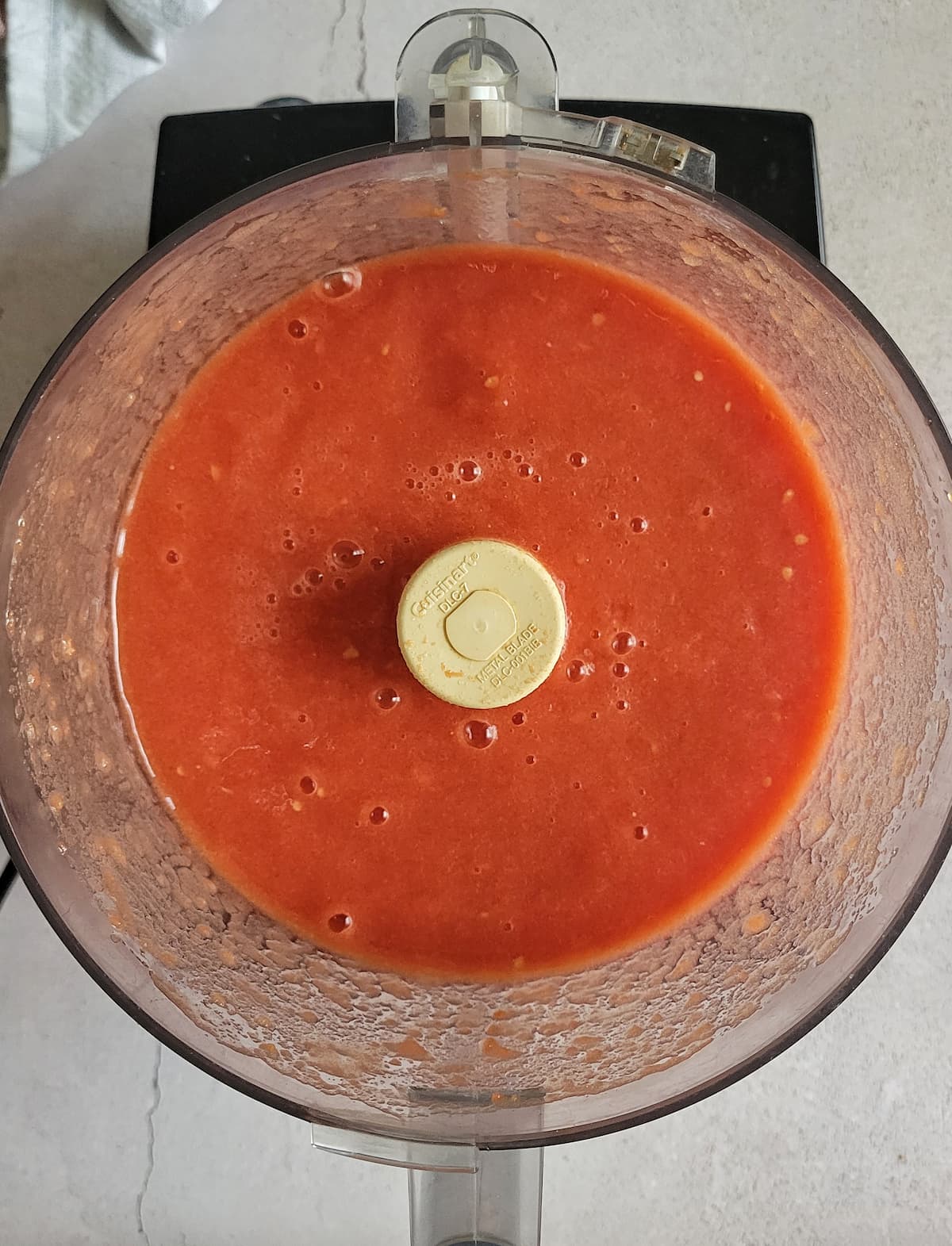 tomato purée in the base of a food processor