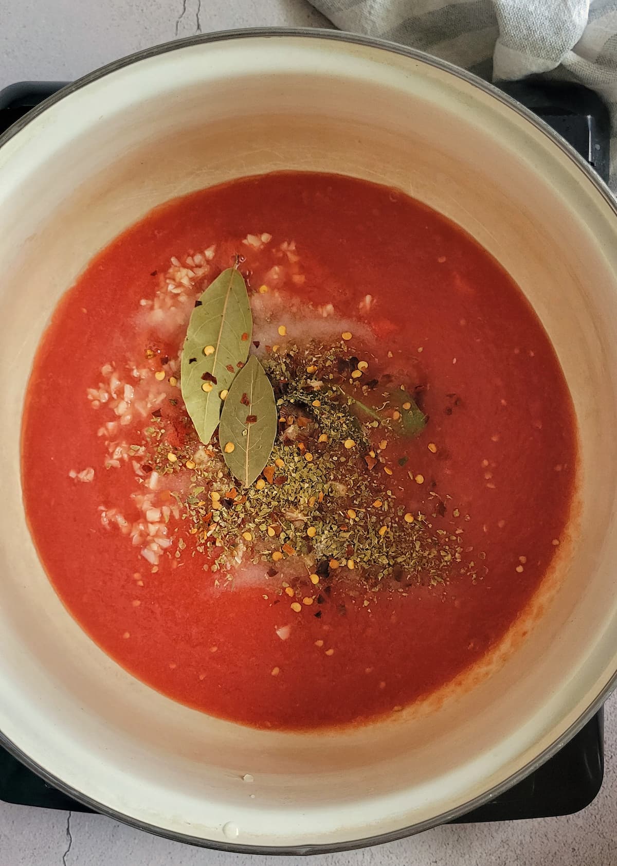 pot of tomato sauce with spices