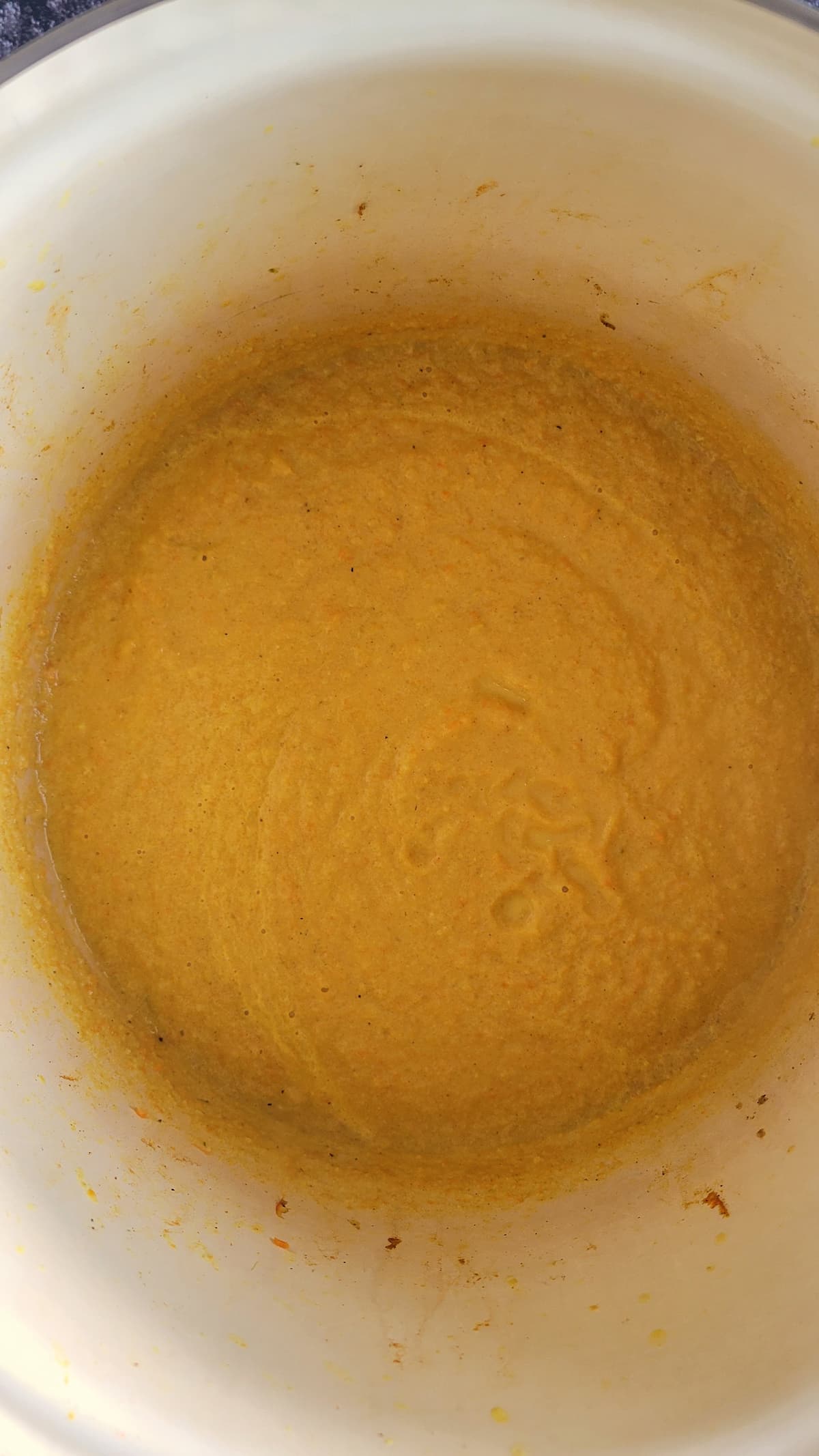 orange purée in a pot