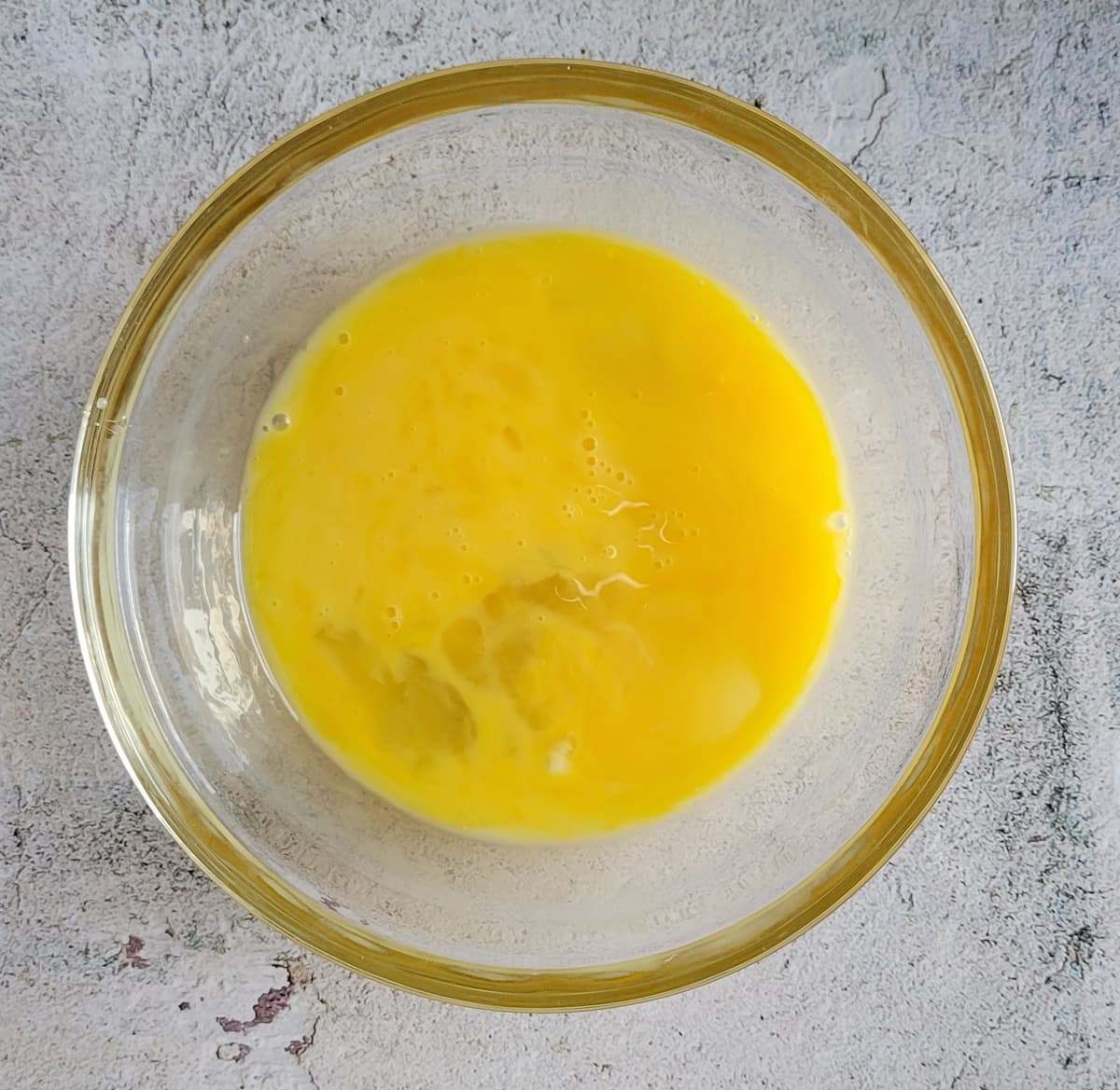 bowl of beaten eggs