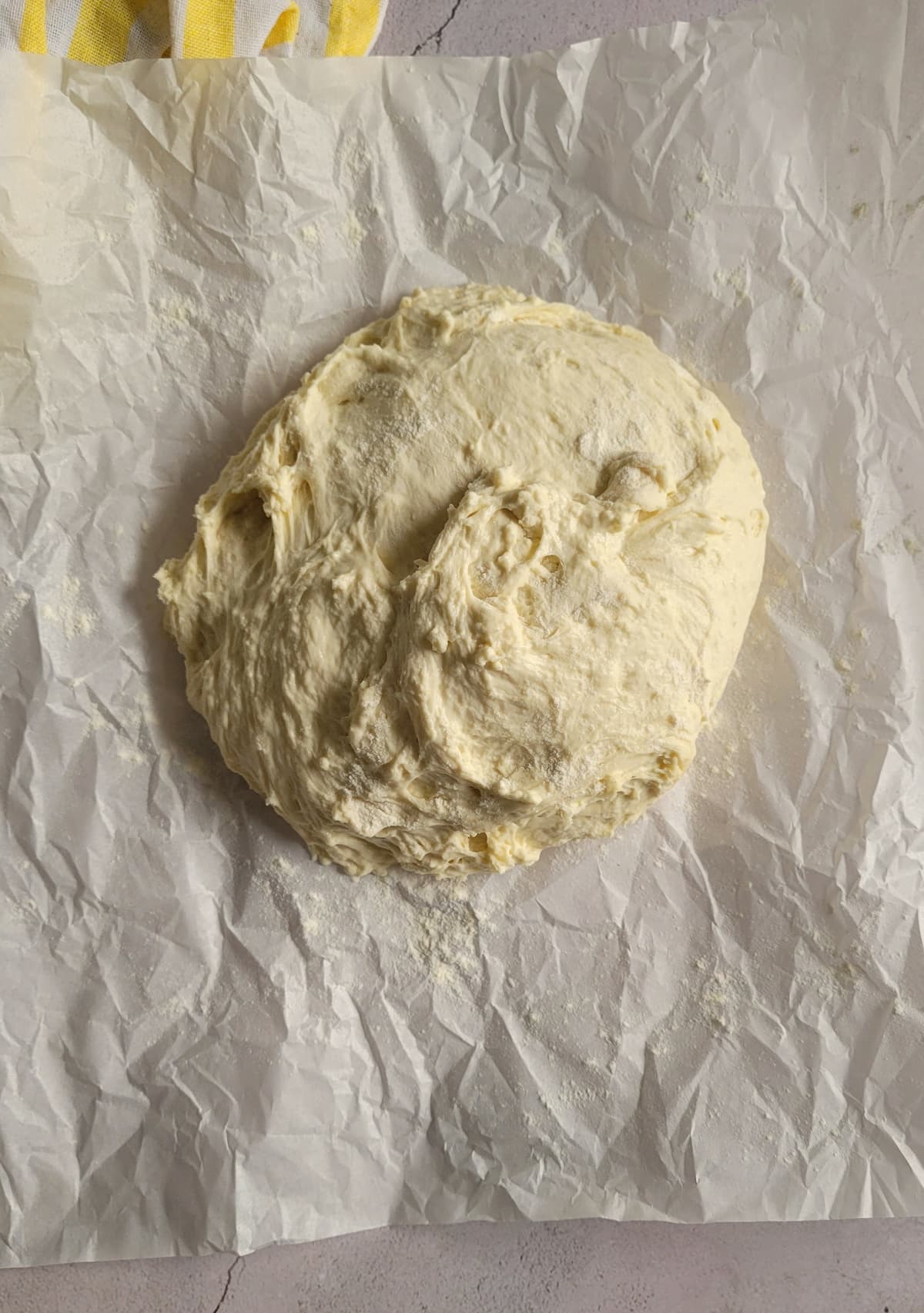 ball of dough on a piece of parchment paper
