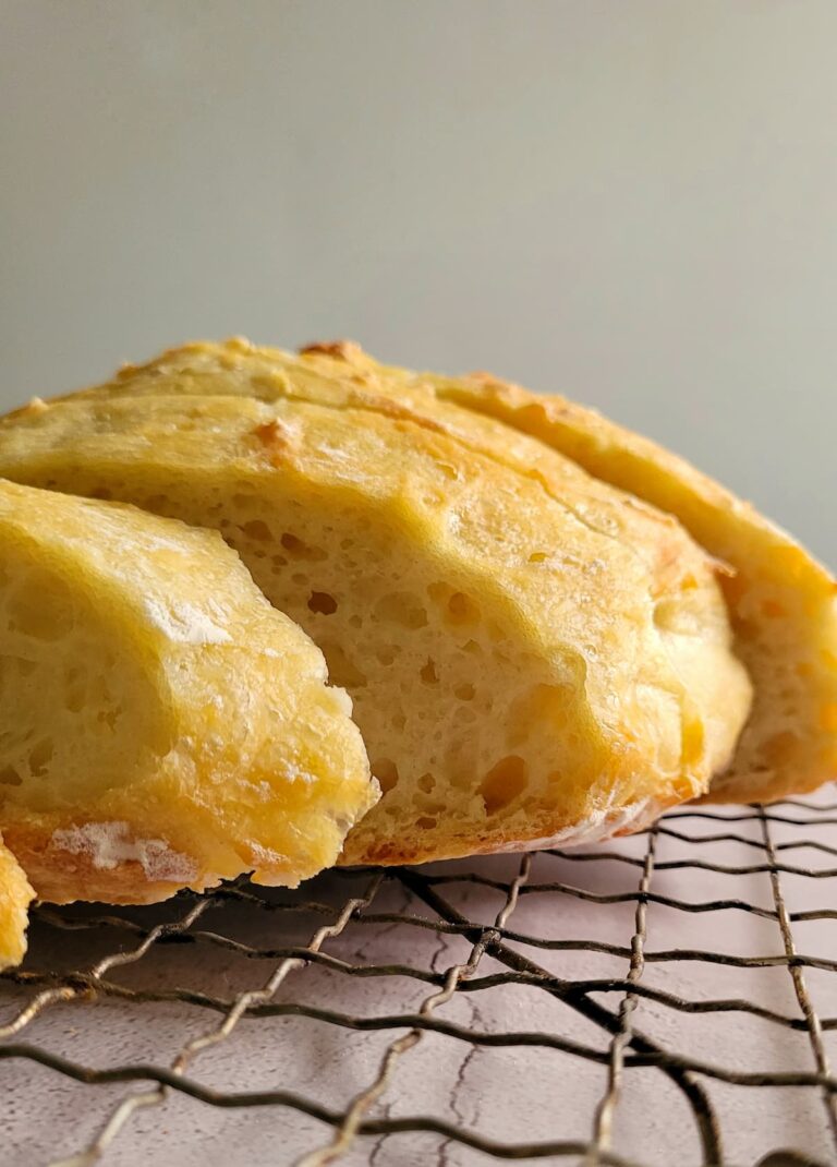 slices of fresh bread on a wire rack