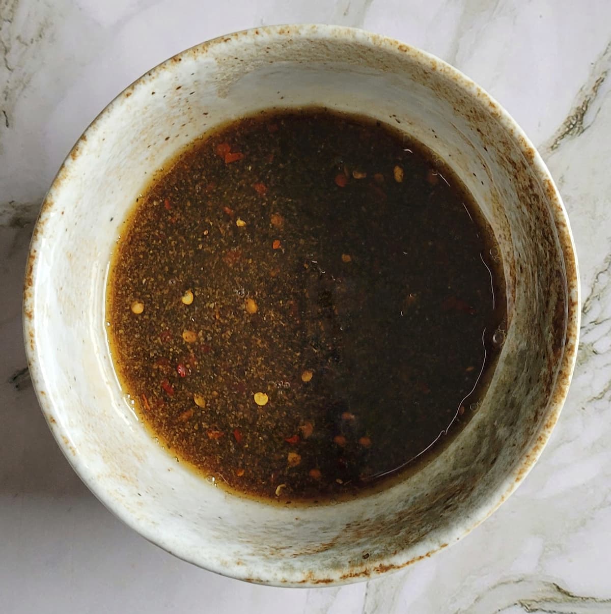 brown liquidy sauce in a bowl