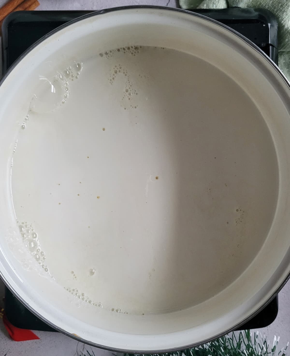 milk in a pot on a burner