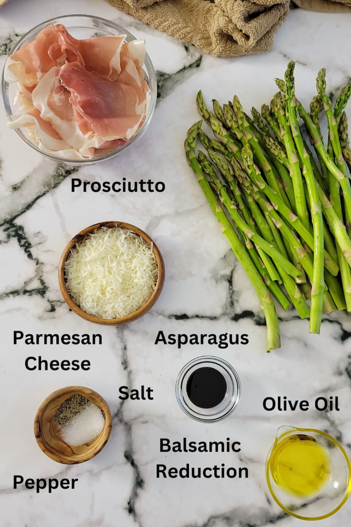 ingredients for asparagus prosciutto wrapped - prosciutto, asparagus, olive oil, parmesan cheese, balsamic reduction, salt, pepper