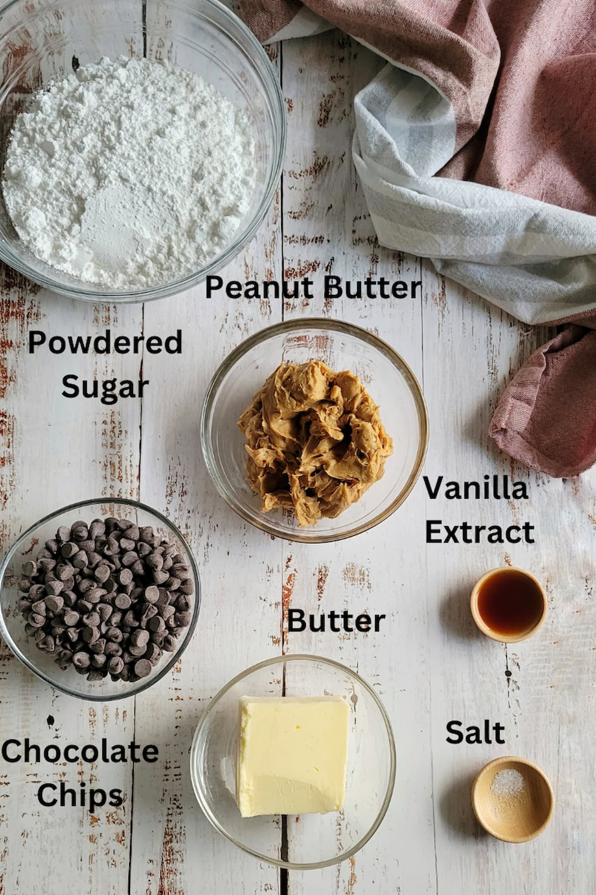 ingredients for peanut butter balls with butter - peanut butter, butter, powdered sugar, chocolate chips, vanilla extract, salt