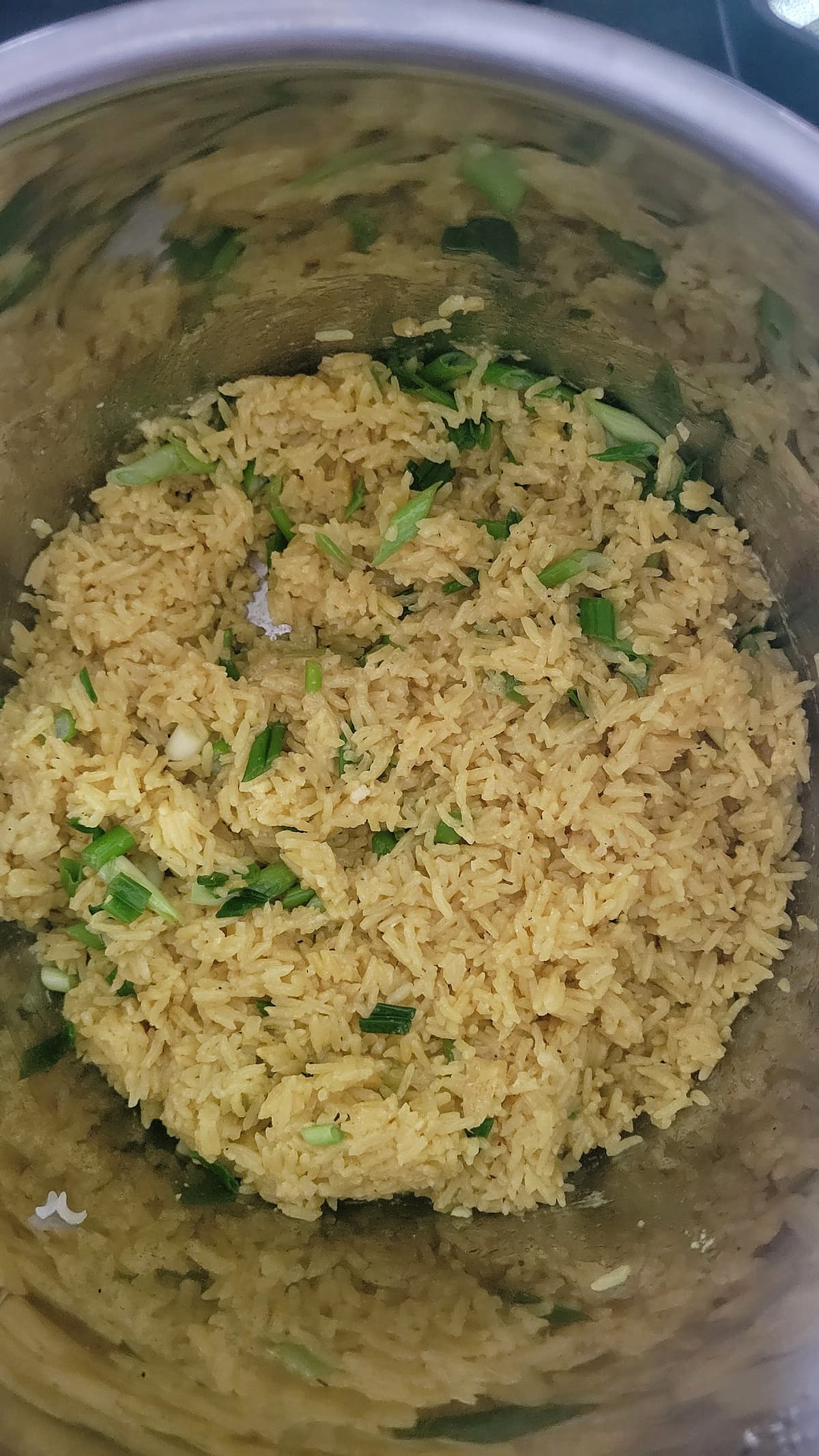 rice and green onions in the instant pot