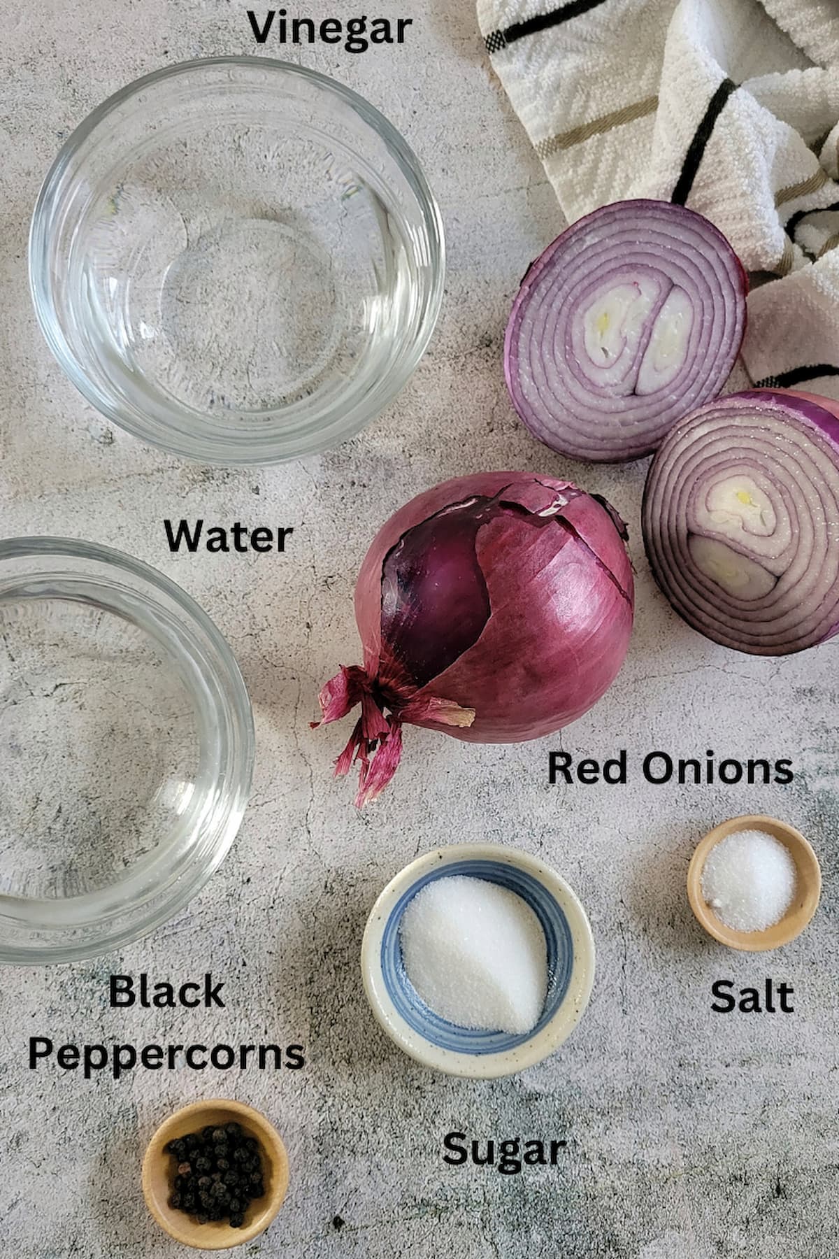 ingredients for onions pickled recipe - red onions, vinegar, water, salt, sugar, black peppercorns