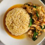 bowl of thai basil chicken with rice