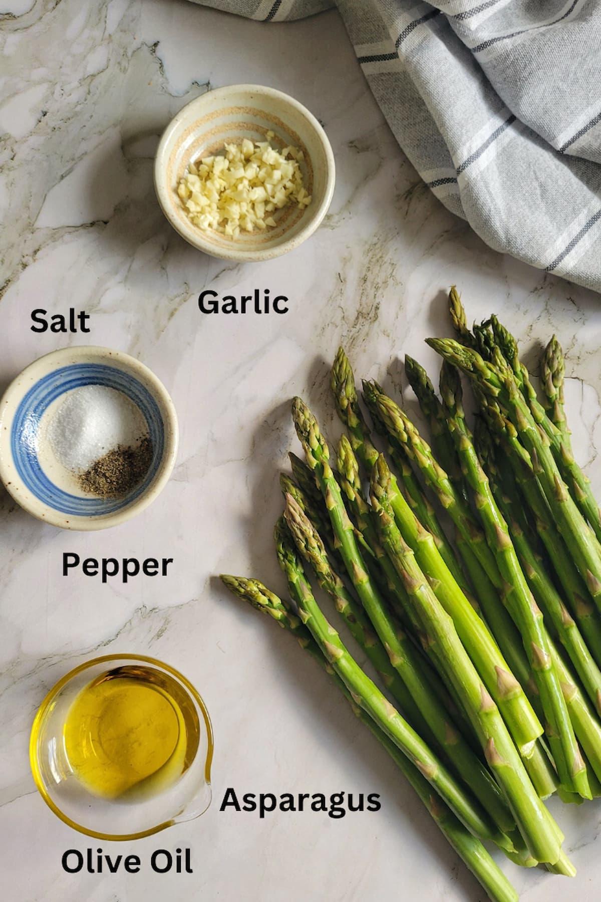 ingredients for roasted asparagus recipe - asparagus, olive oil, salt, pepper, garlic