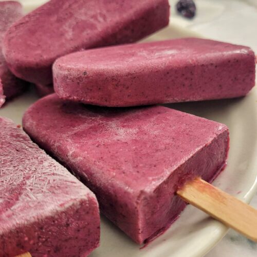 purple popsicles on a plate