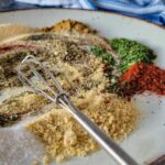 plate of spices with a whisk