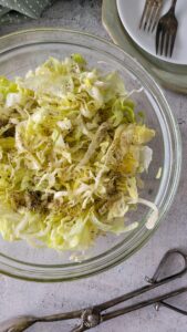 bowl of iceberg lettuce salad with spices