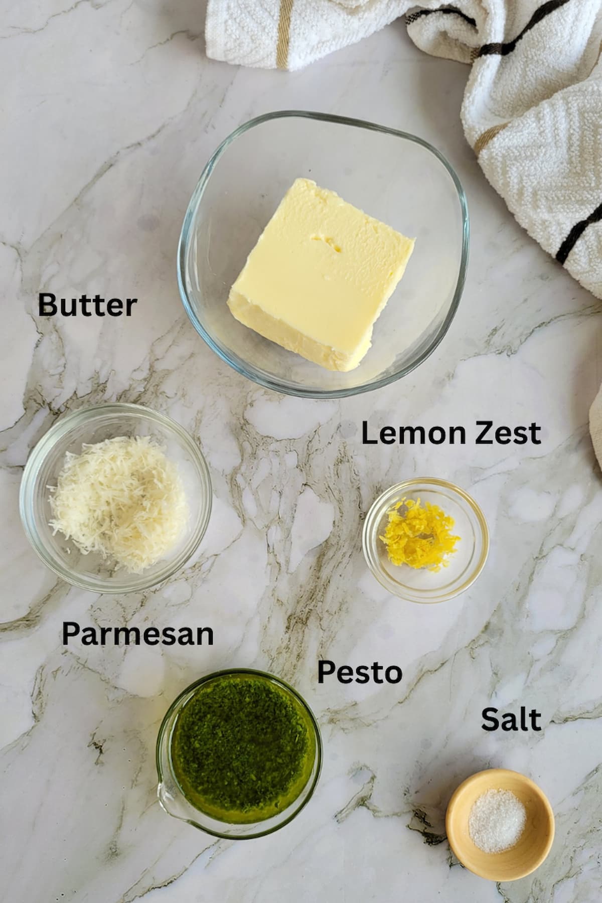 ingredients for pesto butter - butter, pesto, lemon zest, parmesan, salt