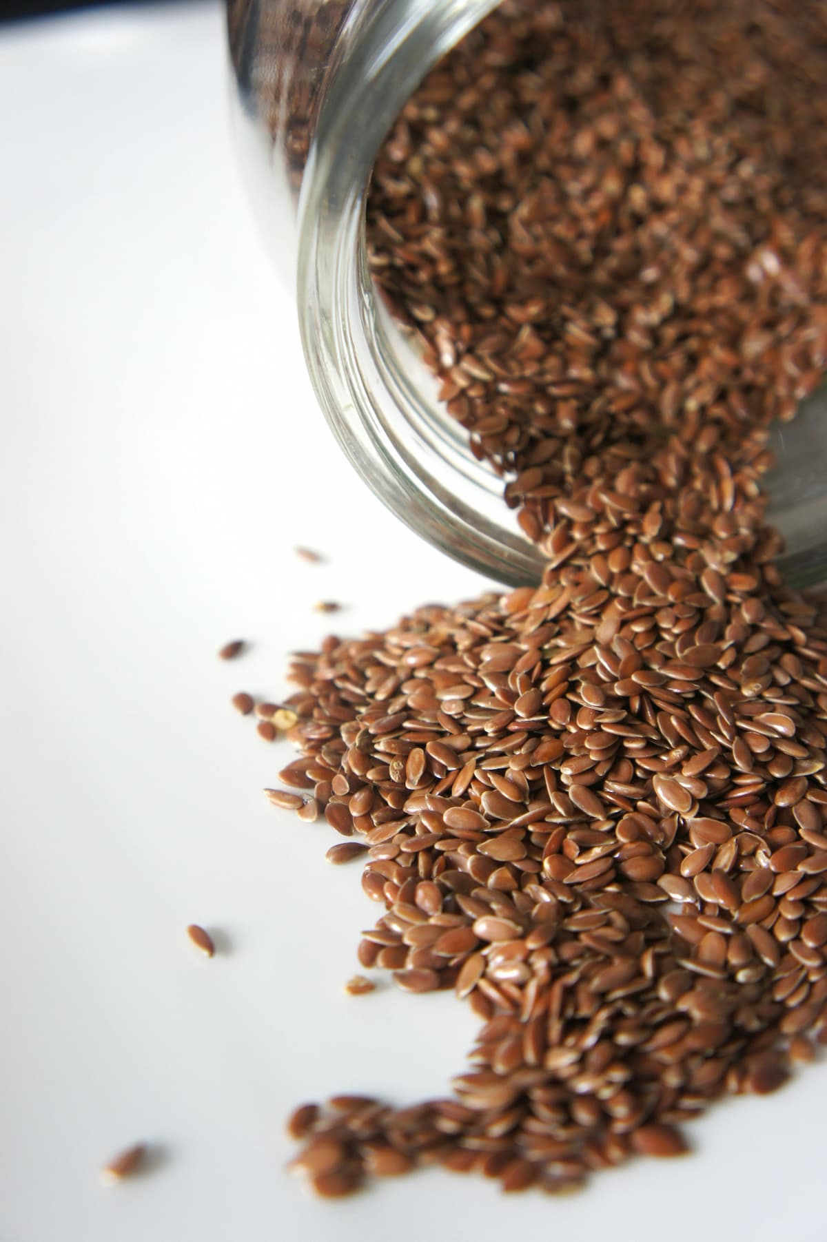 toasted sesame seeds coming out of a jar