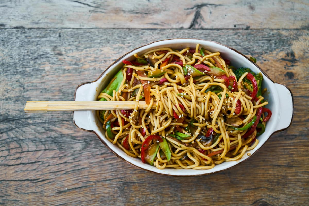 asian noodle dish with sesame oil and veggies
